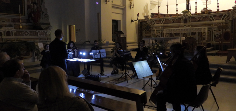 Picture of a string quartet playing at the Church of San Agostino